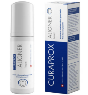 Curaprox Aligner Foam in dispenser bottle with packaging for dental care with aligners
